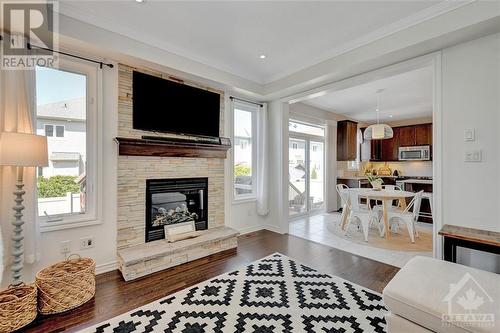 313 Meadowbreeze Drive, Kanata, ON - Indoor Photo Showing Living Room With Fireplace