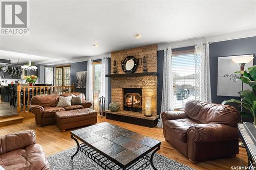 219 Flavelle Crescent, Saskatoon, SK - Indoor Photo Showing Living Room With Fireplace