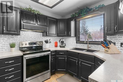 219 Flavelle Crescent, Saskatoon, SK - Indoor Photo Showing Kitchen With Double Sink