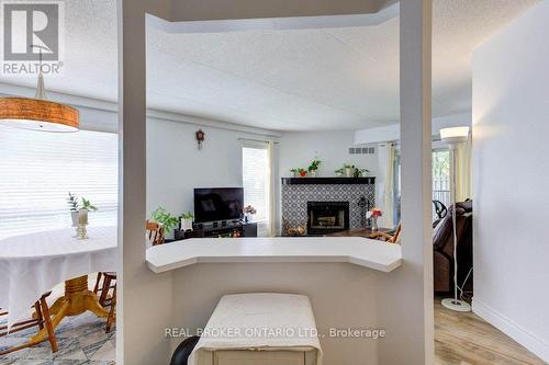 26 - 3085 Kingsway Drive, Kitchener, ON - Indoor With Fireplace