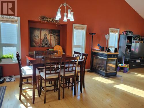 780 Sandy Beach Road, Vanderhoof, BC - Indoor Photo Showing Dining Room With Fireplace