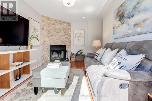 61 Bonnycastle Drive, Clarington, ON - Indoor Photo Showing Living Room With Fireplace