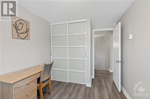 New Modern Closet Doors and Laminate Flooring - 2927 Fairlea Crescent, Ottawa, ON - Indoor Photo Showing Other Room