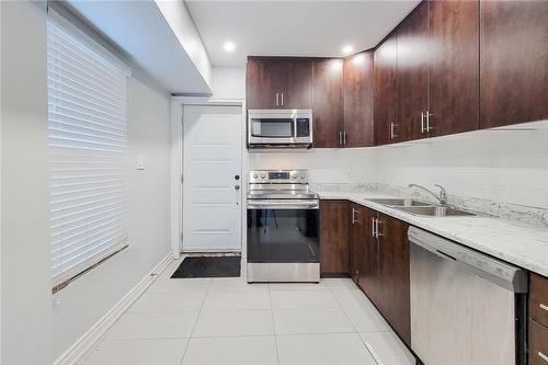 245 Wilson Street, Hamilton, ON - Indoor Photo Showing Kitchen With Double Sink