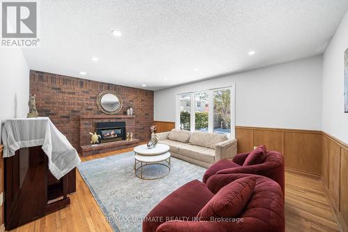22 Chelmsford Avenue, Toronto, ON - Indoor Photo Showing Living Room With Fireplace
