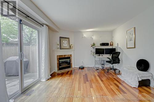2 - 5958 Greensboro Drive, Mississauga, ON - Indoor Photo Showing Living Room With Fireplace