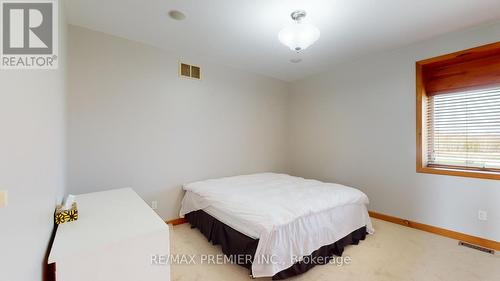 31 Paradise Boulevard, Ramara, ON - Indoor Photo Showing Bedroom