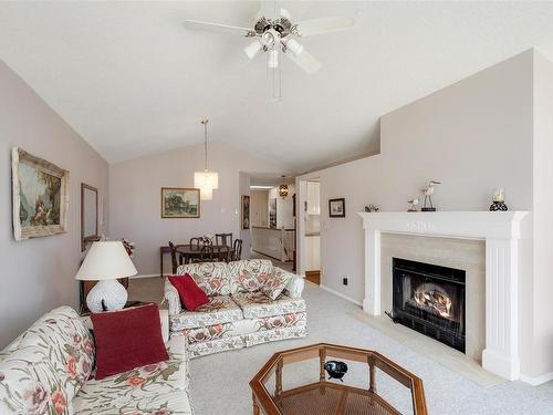404-6880 Wallace Dr, Central Saanich, BC - Indoor Photo Showing Living Room With Fireplace