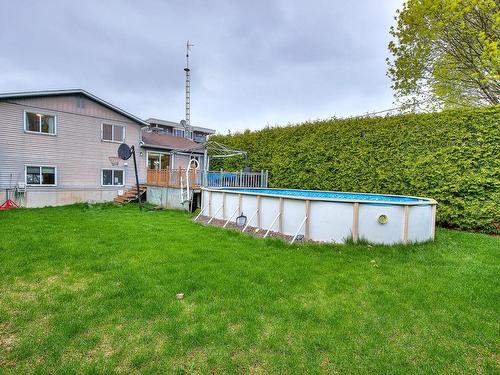 Cour - 7754 Boul. St-Martin O., Laval (Sainte-Dorothée), QC - Outdoor With Above Ground Pool With Backyard