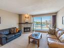 405-3555 Outrigger Rd, Nanoose Bay, BC  - Indoor Photo Showing Living Room With Fireplace 