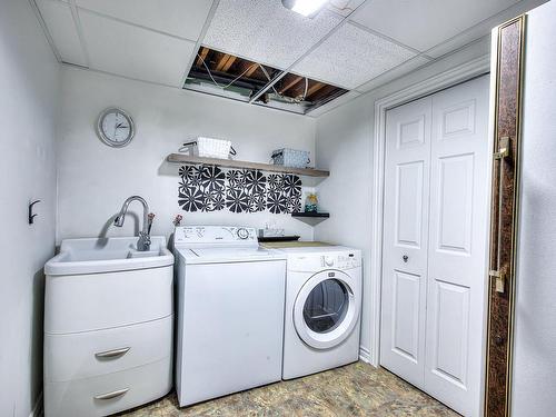 Salle de lavage - 180 Rue Rolland, Sainte-Anne-Des-Plaines, QC - Indoor Photo Showing Laundry Room
