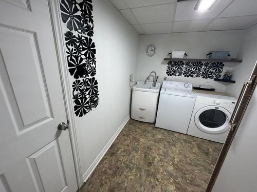 Salle de lavage - 180 Rue Rolland, Sainte-Anne-Des-Plaines, QC - Indoor Photo Showing Laundry Room