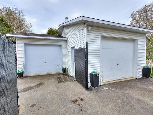 Garage - 180 Rue Rolland, Sainte-Anne-Des-Plaines, QC - Outdoor With Exterior