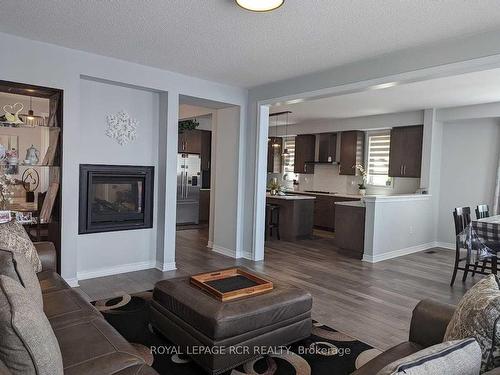 14 Atkinson Cres, New Tecumseth, ON - Indoor Photo Showing Living Room With Fireplace