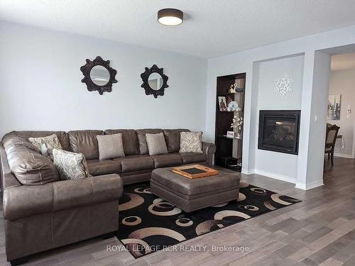 14 Atkinson Cres, New Tecumseth, ON - Indoor Photo Showing Living Room With Fireplace
