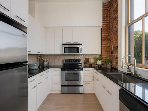 201-610 Johnson St, Victoria, BC - Indoor Photo Showing Kitchen With Upgraded Kitchen