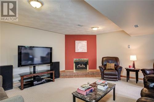 14 Adam Street, Lively, ON - Indoor Photo Showing Living Room With Fireplace