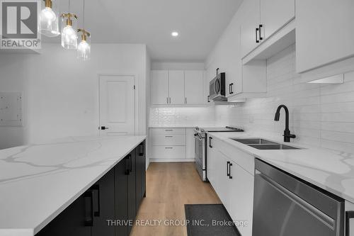 133 - 3900 Savoy Street, London, ON - Indoor Photo Showing Kitchen With Double Sink With Upgraded Kitchen
