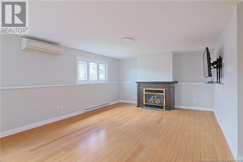 62 Mcgibbon Street, Fredericton, NB - Indoor With Fireplace