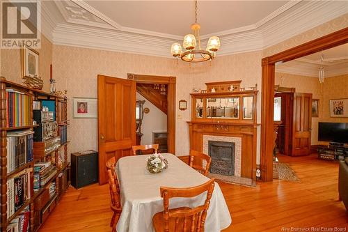 26-30 Golf Club Road, Fredericton, NB - Indoor Photo Showing Dining Room With Fireplace