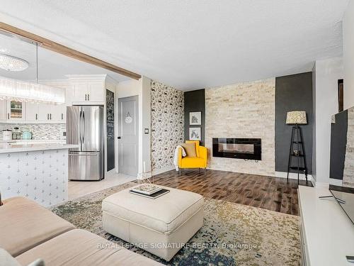 505-60 Pavane Linkway, Toronto, ON - Indoor Photo Showing Living Room With Fireplace