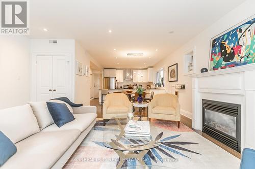 117 Chaplin Crescent, Toronto, ON - Indoor Photo Showing Living Room With Fireplace