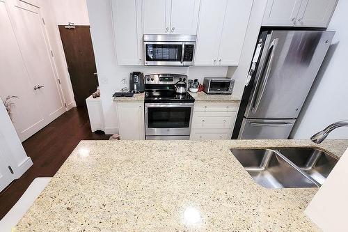 112 King Street E|Unit #410, Hamilton, ON - Indoor Photo Showing Kitchen With Double Sink