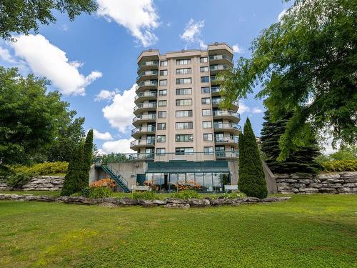 Back facade - 609-160 Ch. De La Rive-Boisée, Montréal (Pierrefonds-Roxboro), QC - Outdoor With Balcony With Facade