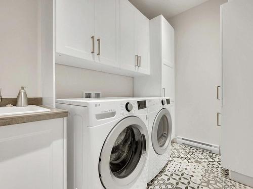 Salle de lavage - 200 Allée Des Weskarinis, Mont-Tremblant, QC - Indoor Photo Showing Laundry Room