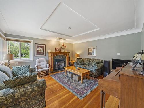 1087 Burnside Rd West, Saanich, BC - Indoor Photo Showing Living Room With Fireplace