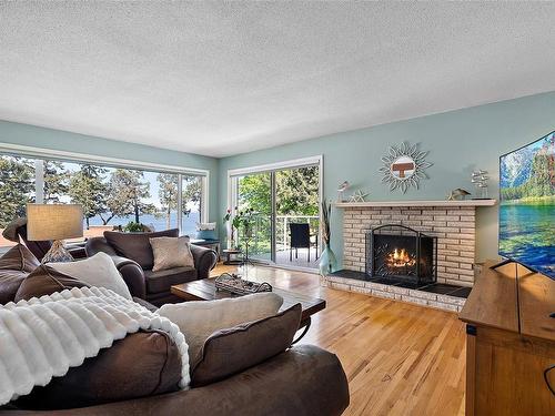 4747 Carloss Pl, Saanich, BC - Indoor Photo Showing Living Room With Fireplace