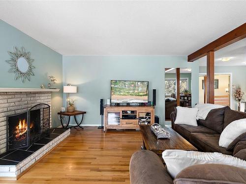 4747 Carloss Pl, Saanich, BC - Indoor Photo Showing Living Room With Fireplace