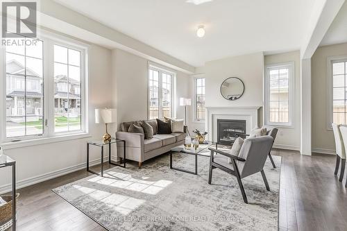 439 Black Cherry Crescent, Shelburne, ON - Indoor Photo Showing Living Room With Fireplace