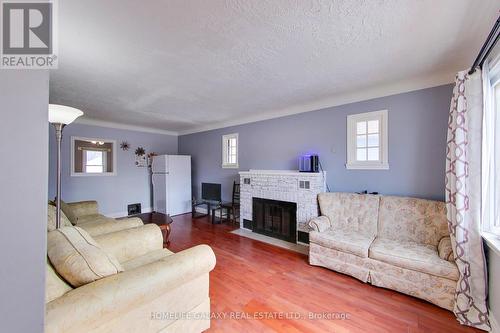 668 Copland Road, Sarnia, ON - Indoor Photo Showing Living Room With Fireplace