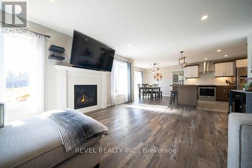 67 Curtis Street, East Zorra-Tavistock, ON - Indoor Photo Showing Living Room With Fireplace