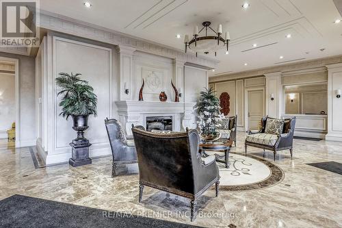 208 - 9235 Jane Street, Vaughan, ON - Indoor Photo Showing Living Room With Fireplace