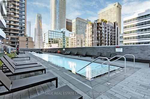 404 - 50 Charles Street E, Toronto, ON - Outdoor With In Ground Pool With Facade