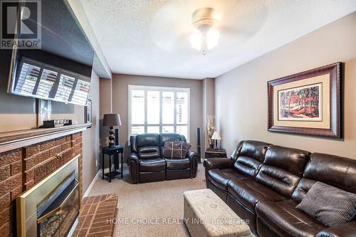 18 Jamieson Crescent, Whitby, ON - Indoor Photo Showing Living Room With Fireplace
