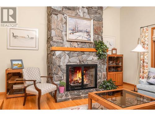 9237 Kokanee Road, Vernon, BC - Indoor Photo Showing Living Room With Fireplace