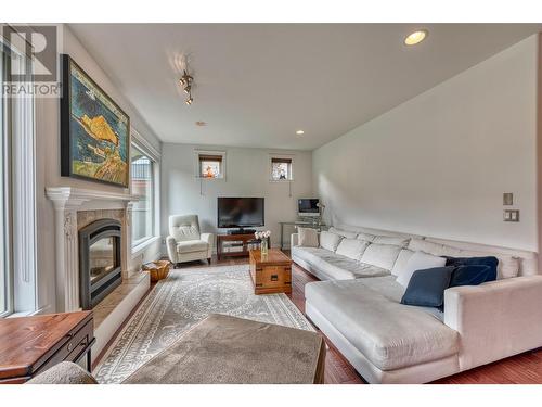 5254 Cobble Crescent, Kelowna, BC - Indoor Photo Showing Living Room With Fireplace