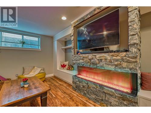 5254 Cobble Crescent, Kelowna, BC - Indoor Photo Showing Other Room With Fireplace