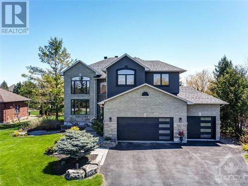 6900 Lakes Park Drive, Greely, ON - Outdoor With Facade