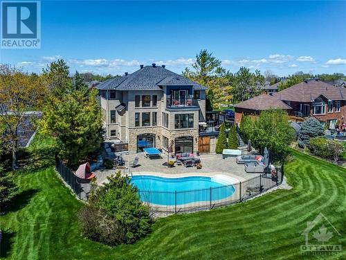 6900 Lakes Park Drive, Greely, ON - Outdoor With In Ground Pool