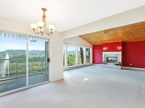 346/370 Nenzel Rd, Qualicum Beach, BC - Indoor With Fireplace