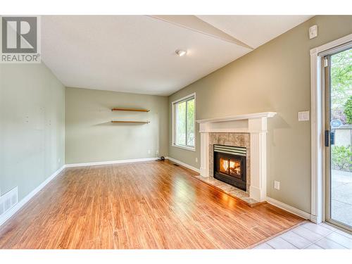 1634 Carmi Avenue Unit# 159, Penticton, BC - Indoor Photo Showing Living Room With Fireplace