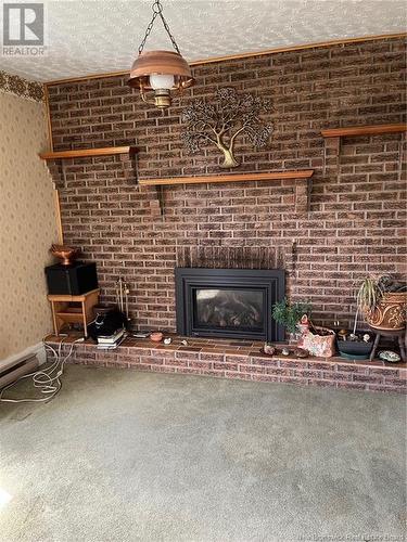 674 Passekeag Road, Passekeag, NB - Indoor Photo Showing Living Room With Fireplace