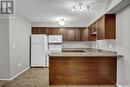 106 215 Smith Street N, Regina, SK  - Indoor Photo Showing Kitchen 