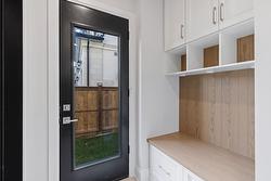 Functional Mud Room with basement, garage, and outdoor access. - 