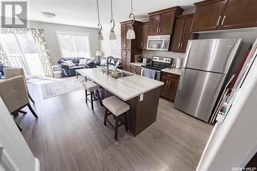 123 Plains Circle, Pilot Butte, SK - Indoor Photo Showing Kitchen With Upgraded Kitchen