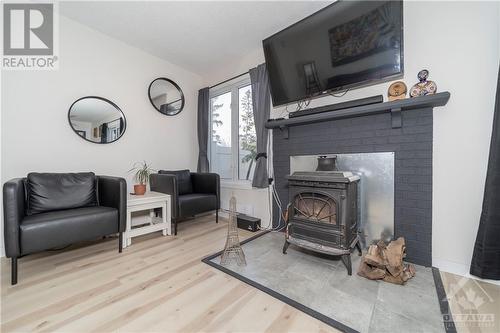 170 Rushford Private, Ottawa, ON - Indoor Photo Showing Living Room With Fireplace